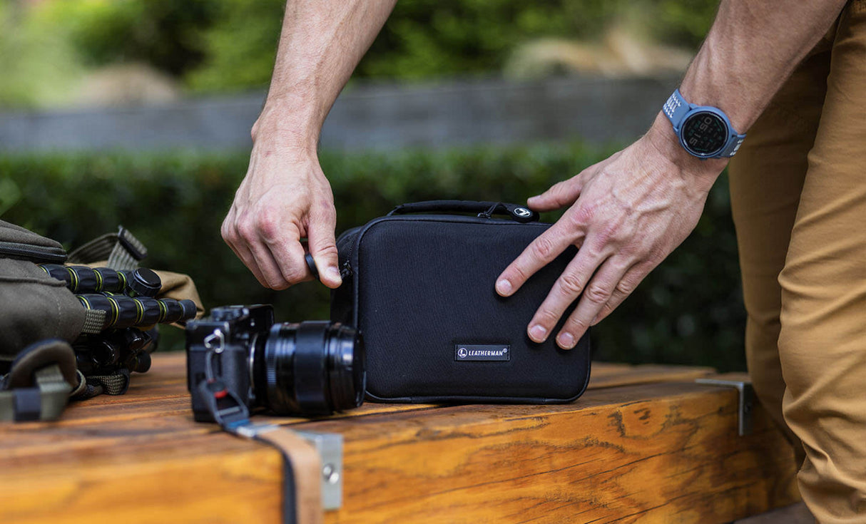 Translation missing: en.Man closing LeathermanĀ® Adapt Kit