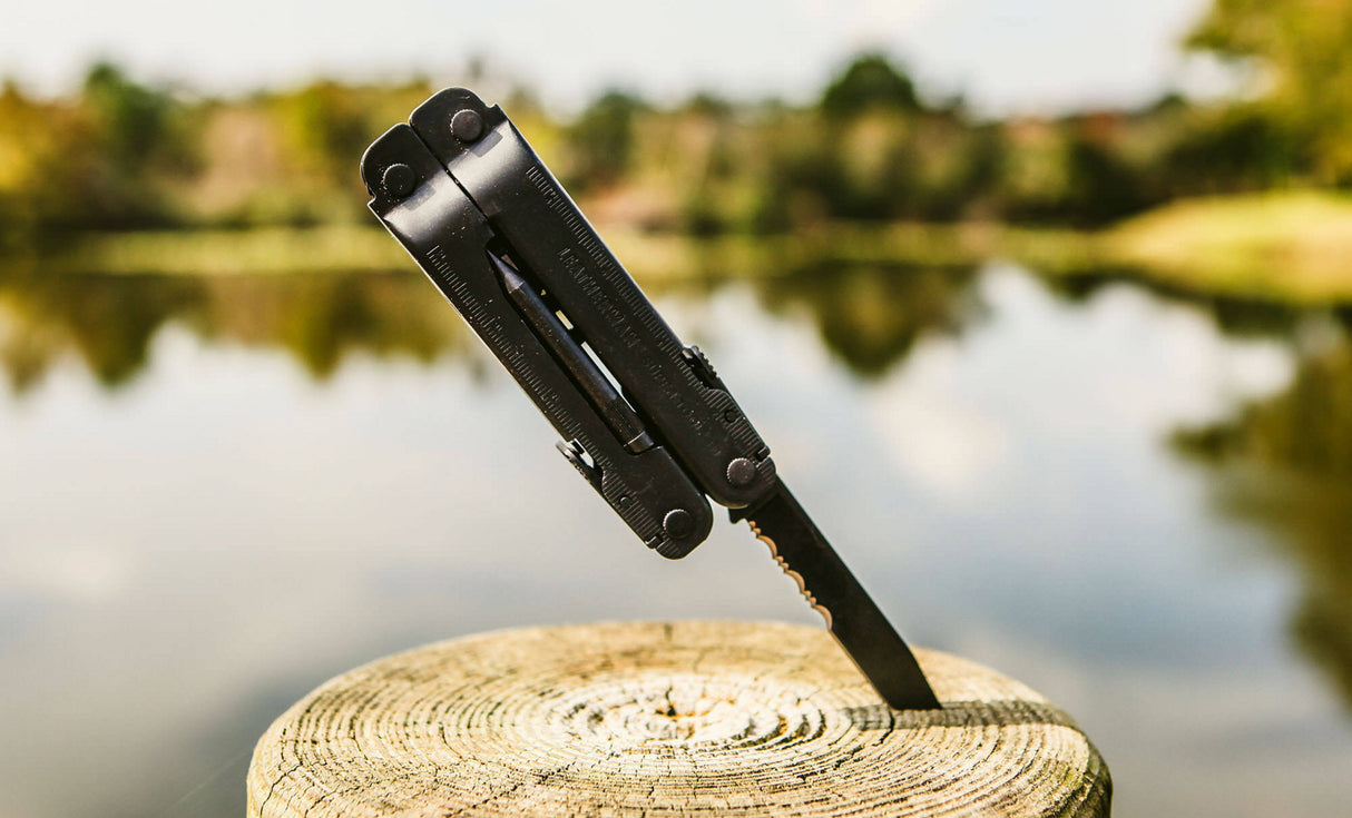 Translation missing: en.Supertool 300 EOD stuck into a stump by a lake