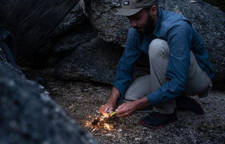 Person holding an open Raptor Rescue showing the shears.