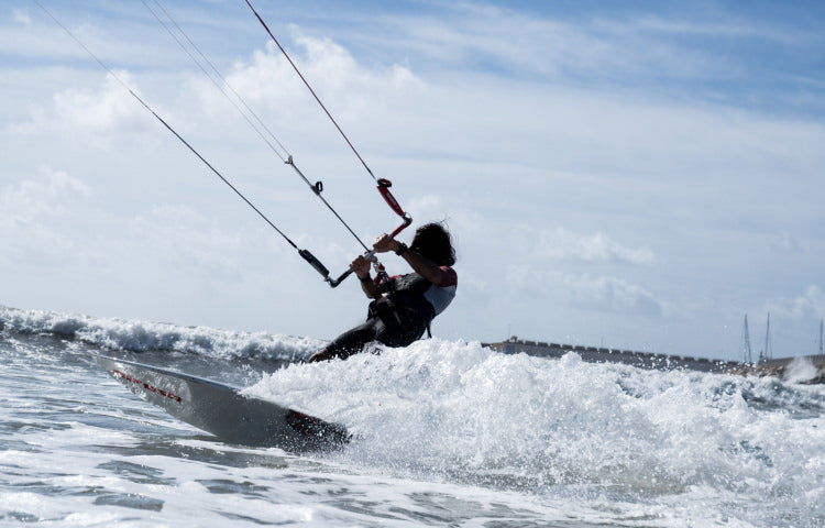 man kitesurfing