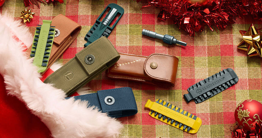Translation missing: en.Assorted Leatherman nylon sheaths, bit kit, and ratchet driver on a festive background with holiday decorations