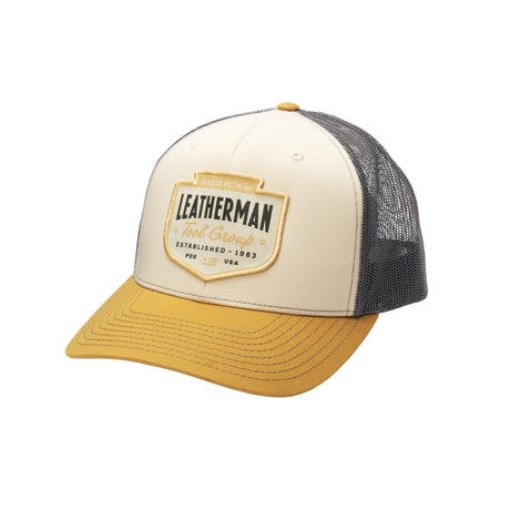 Translation missing: en.Mink Beige Leatherman Pacific Northwest Trucker Hat with a stitched emblem. Established 1983