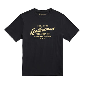 Translation missing: en.Front of the black Leatherman Vintage tee showcasing &#39;Leatherman&#39; in a cursive font. Established 1983 in Portland, Oregon USA
