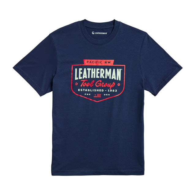 Translation missing: en.Navy Leatherman Pacific Northwest tee with a red emblem logo. Established 1983