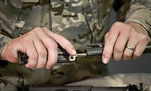 Translation missing: en.MUT EOD carbon scraper used to clean gun