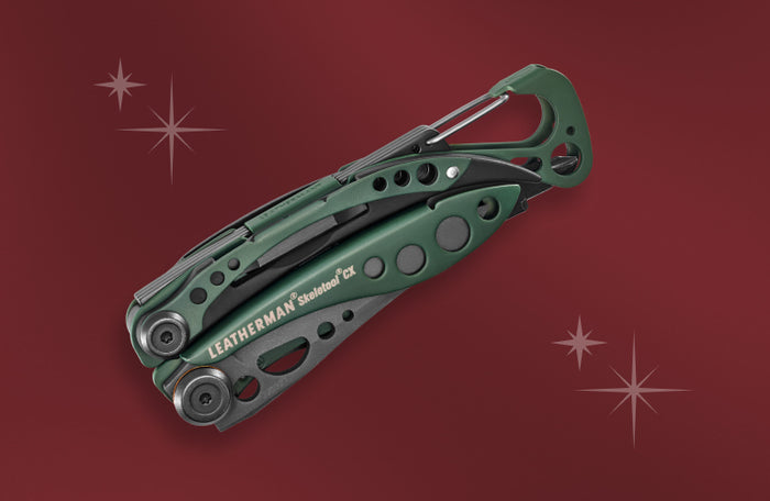 Translation missing: en.A green Leatherman Skeletool CX on a red background with a start pattern, emphasizing its utility and aesthetic appeal
