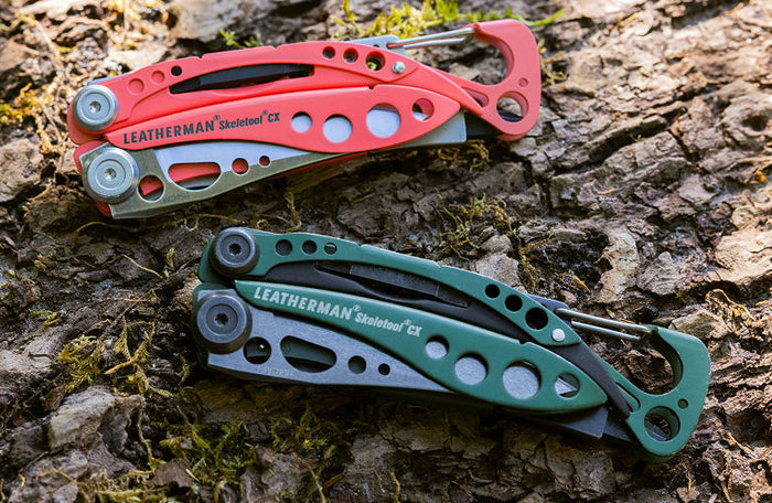 Translation missing: en.Two Leatherman Skeletool CX are positioned on the ground, showcasing their various tools and features