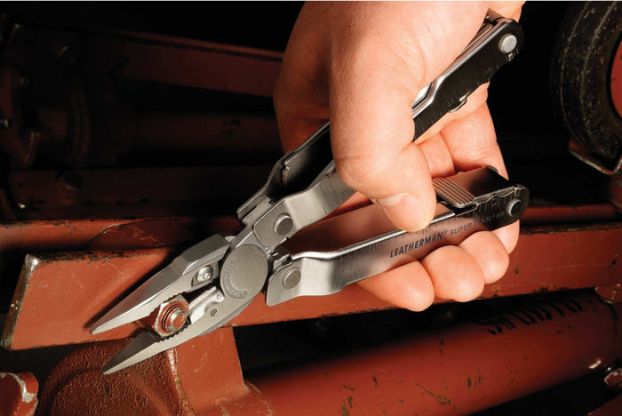 Using Super Tool 300 pliers to tighten a nut